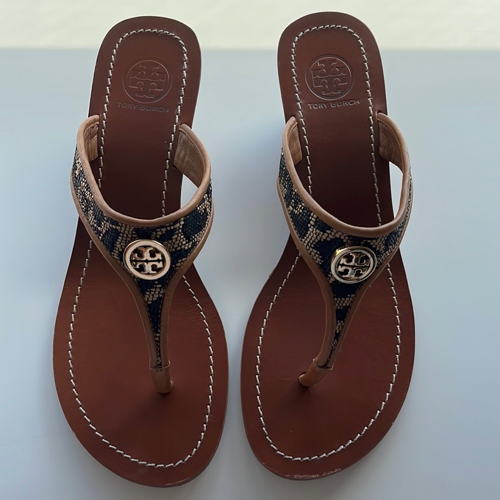 Like new Tory Burch low wedge with snake skin design. Size 7